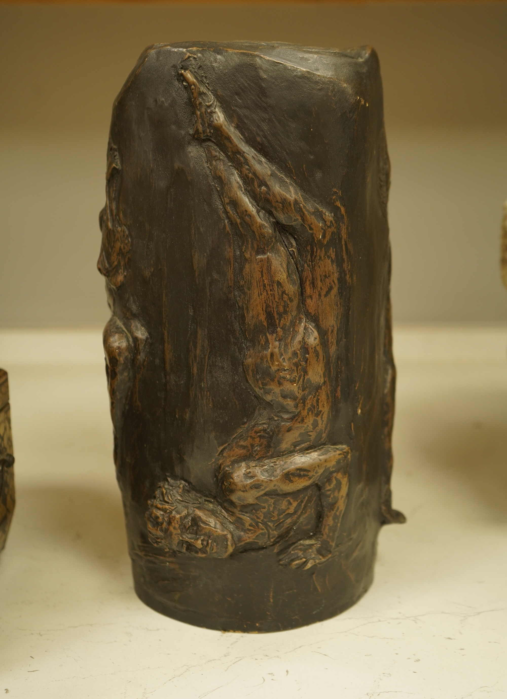 A decorative Art Nouveau style sculpture decorated with figures in relief, 32cm high